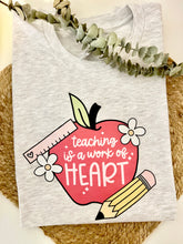 Load image into Gallery viewer, Teaching is a Work of Heart Tee
